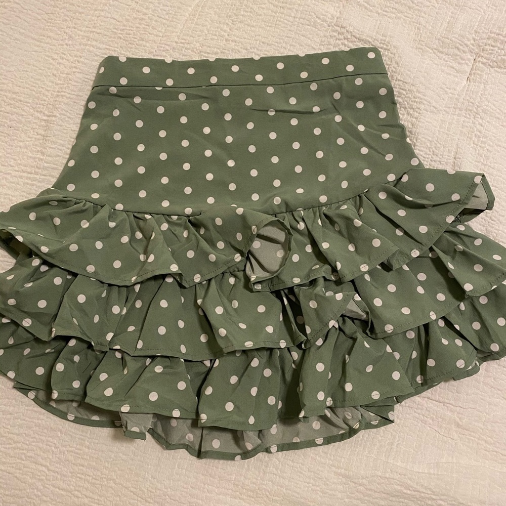 Green ruffled skirt
